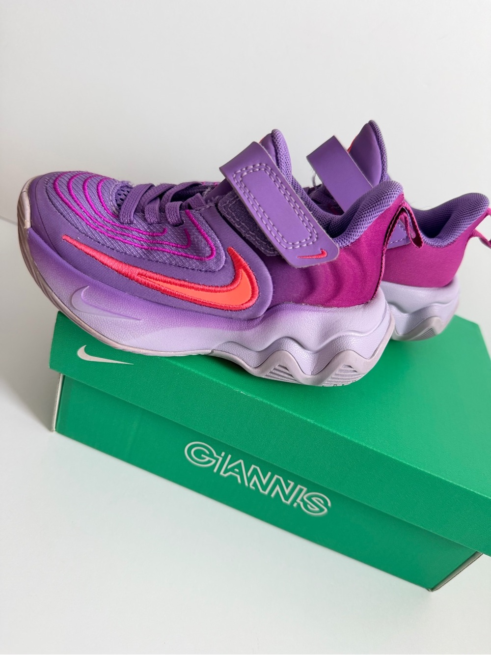 Nike Kids Purple and Pink Giannis Basketball Sneaker with Orange Swoosh